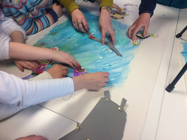 children learning about fish in the river through creative activities