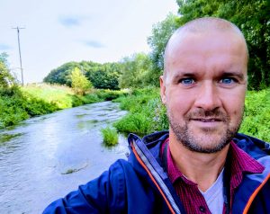 Me next to the River Perry in Shropshire