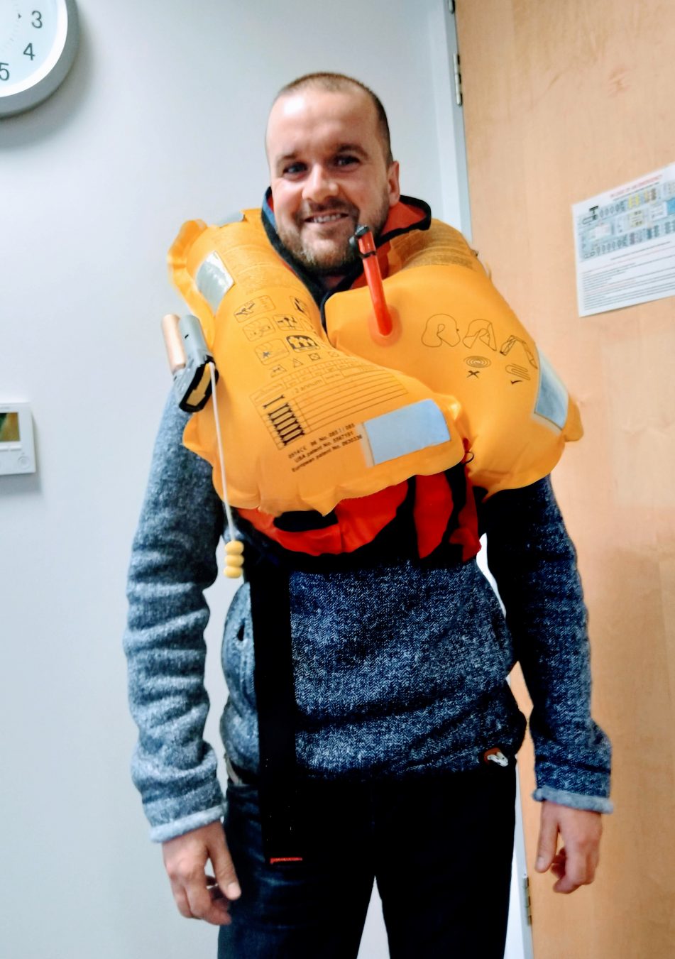 Pete wearing an inflated lifejacket